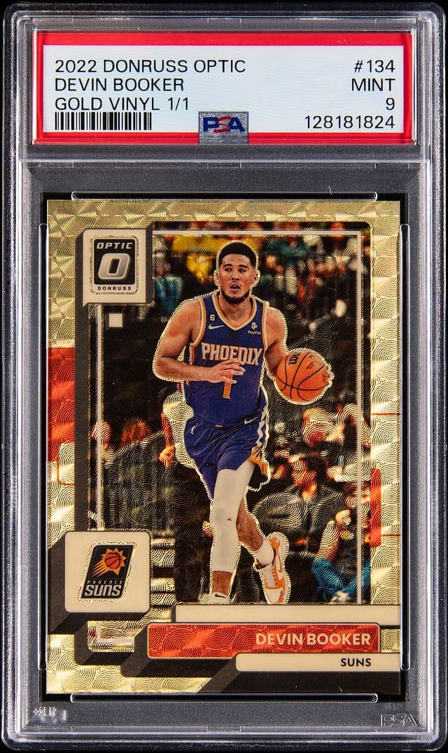 2022-23 Panini Donruss Optic Gold Vinyl Prizm #134 Devin Booker (#1/1) - Jersey Number - PSA MINT 9